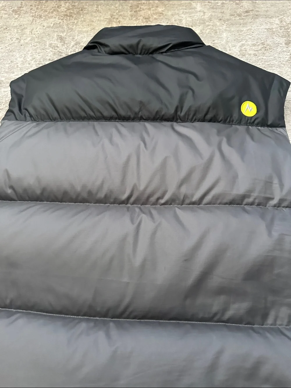 Marmot Men’s Large Gray and Yellow Puffy Down Vest. 700-fill.